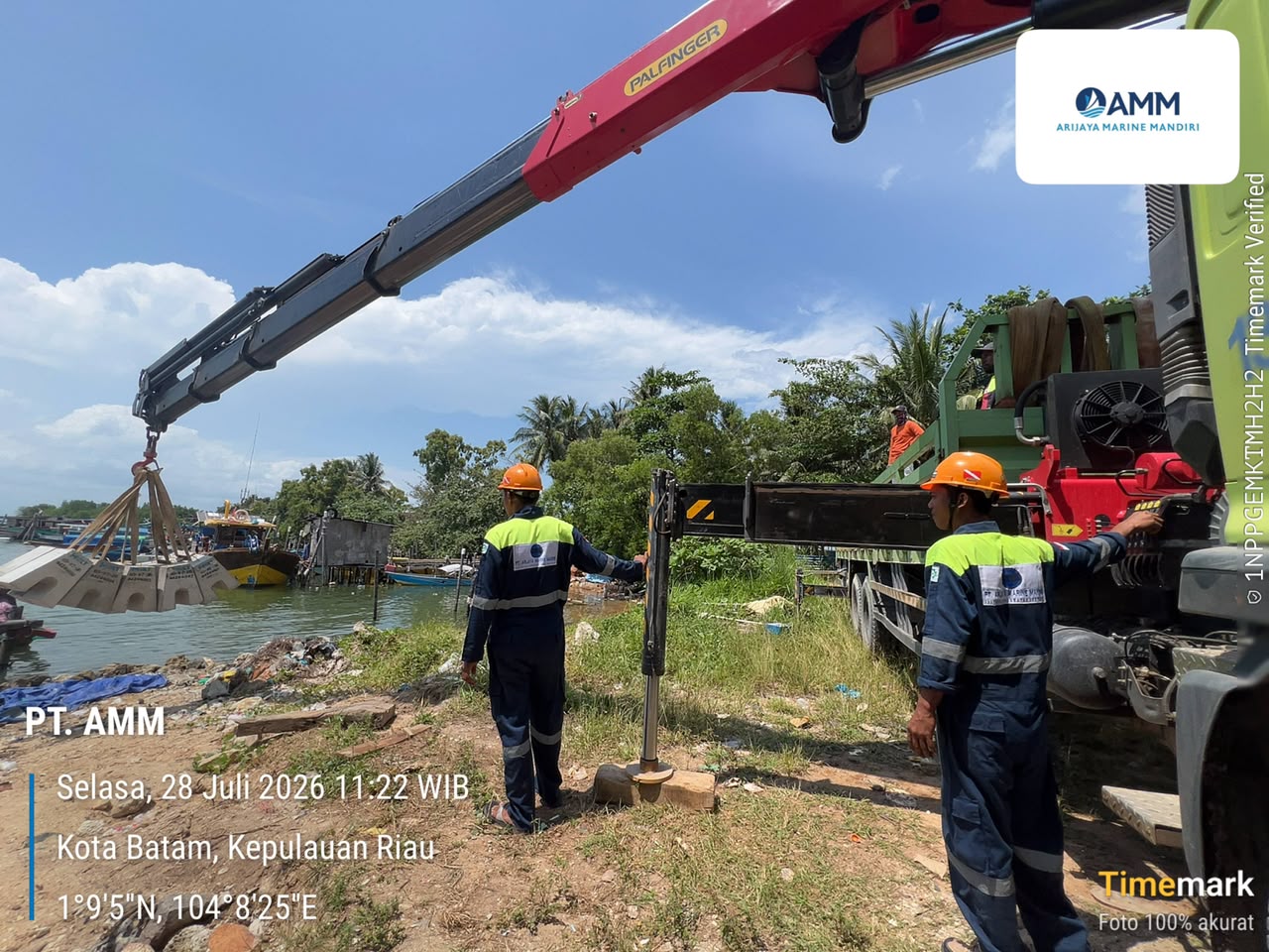 Operator truck crane AMM lifting Product Duct Anchor at jetty